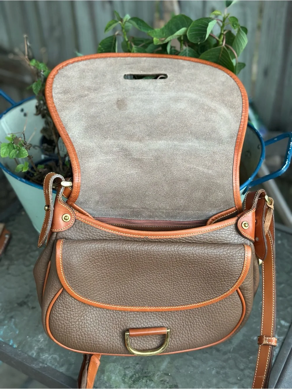 Dooney & Bourke Brown Pebbled Leather Horseshoe Crossbody with Tan Trim